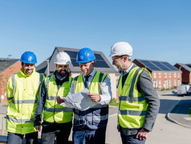 People looking at plans